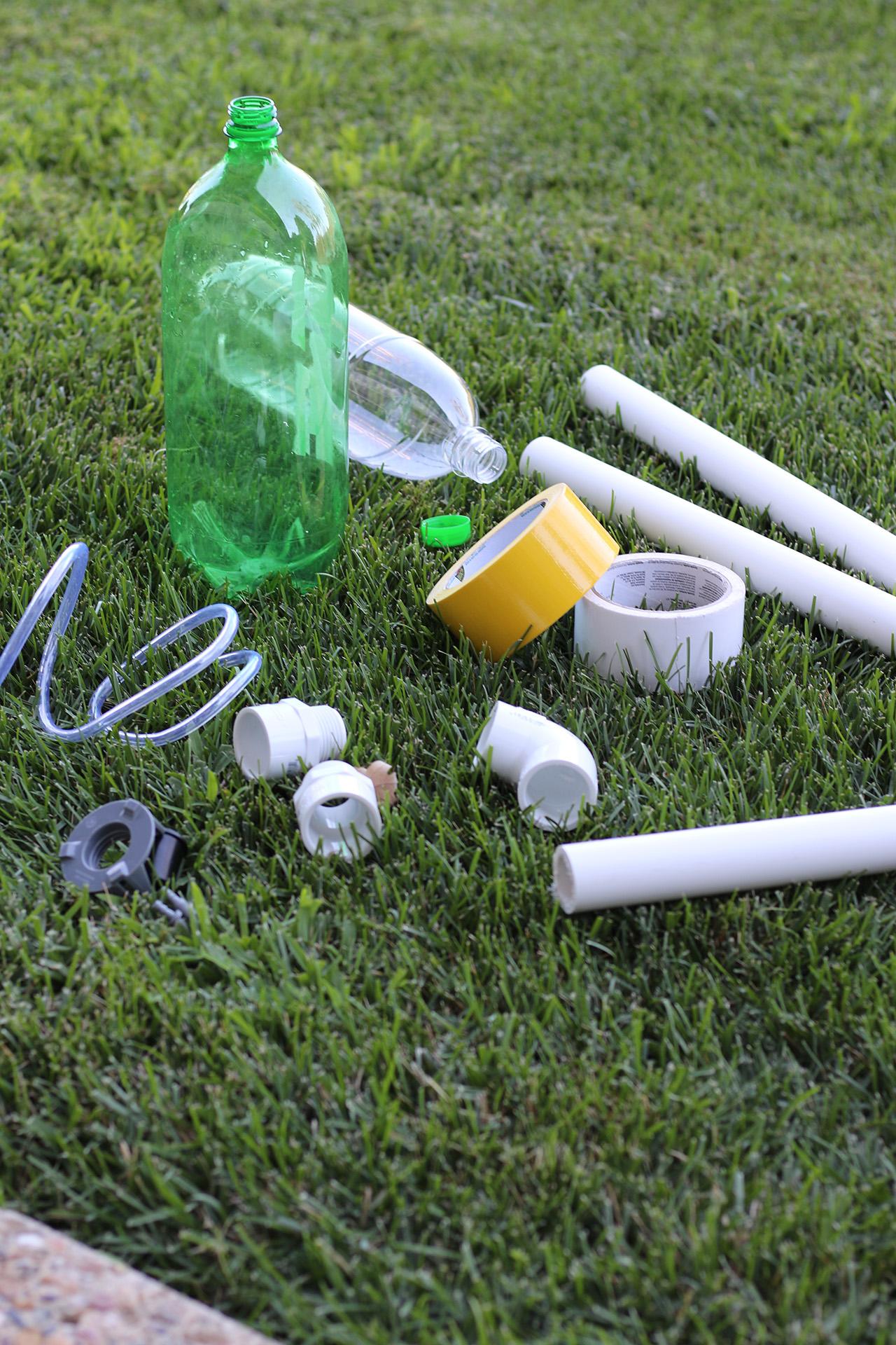 Close up of science project materials lying on grass